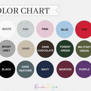 May include: Color chart showing 15 different colors of t-shirts. The colors are: white, ash, pink, blue, red, sport grey, sand, dark chocolate, forest green, military green, black, dark heather, navy, maroon, and purple.