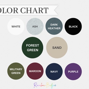 May include: Color chart with 12 different color options for apparel. The colors are: white, ash, dark heather, black, forest green, sand, military green, maroon, navy, purple, and rainbow.