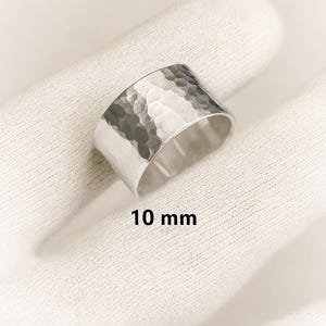 Solid Sterling silver hammered adjustable ring. 925 sterling Thumb ring. Adjustable from size K to N. (10 mm width)