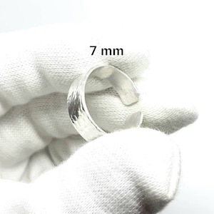 Solid Sterling silver hammered adjustable ring. 925 sterling silver Thumb ring. Adjustable from size N to P. (7 mm width)