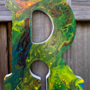 Initial Letter R on acrylic Pour Paint