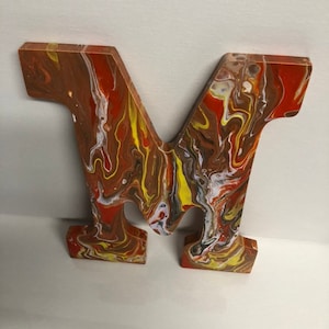 Initial Letter M on acrylic Pour Paint