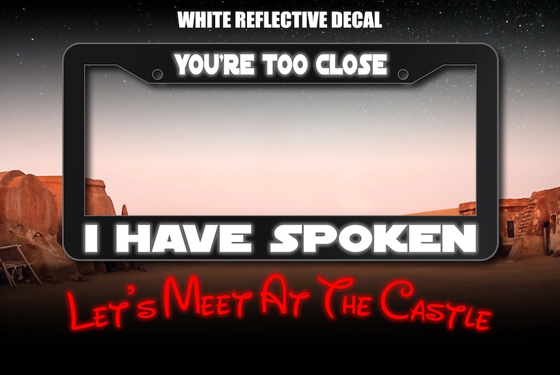 May include: White reflective decal with the text "You're Too Close. I Have Spoken. Let's Meet At The Castle" in a black frame. The decal is set against a desert landscape.