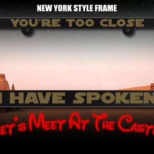 May include: A black license plate frame with gold text that reads "You're Too Close I Have Spoken" and red text that reads "Let's Meet At The Castle".