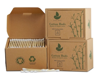 May include: Three cardboard boxes containing 300 biodegradable bamboo and organic cotton buds. The boxes are brown with green leaf designs and the text "leaf boat Cotton Buds Bamboo & Organic cotton 100% biodegradable 300 buds" printed on them.