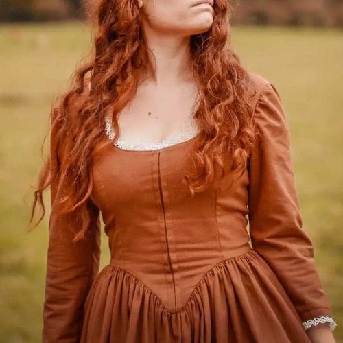 demelza red dress Demelza Poldark (Eleanor Tomlinson) Red gown.. Poldark (2015-2019).. Costume by Susannah Buxton