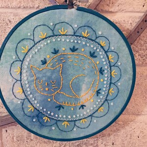 Handmade Curled Up Cat on a Scalloped Rug Embroidery Hoop.