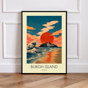 May include: A framed art print featuring a stylised landscape of Burgh Island in Devon. The scene depicts a large red sun setting over the ocean, a crashing wave in the foreground, and a small island with buildings. The text reads BURGH ISLAND DEVON.