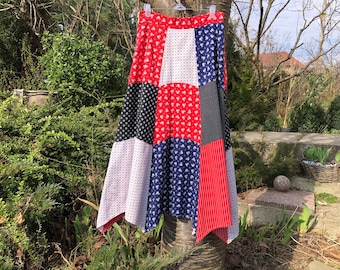 Vintage patchworkrok uit de jaren 60 en 70. Paneelskirt met hippie-calicoprint. Maat S