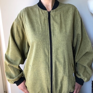 Vintage bomber. Greenish colour ULTIMO M size bomber.