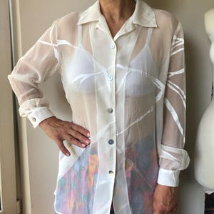 Vintage 90s sheer white silk blouse. Long sleeve button up collared blouse. M/L size.