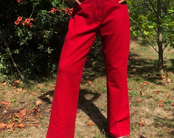 vintage 90s fait des fonds de cloche des années 70. Pantalon évasé mi-haut en laine rouge. Taille M