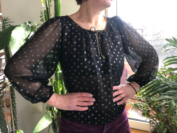 black blouse with gold polka dots