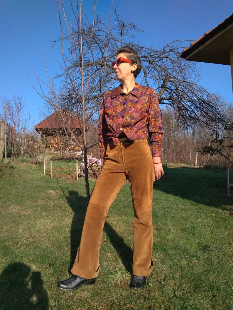 Vintage suede bell bottoms Vintage 90s does 60s brown suede pants.