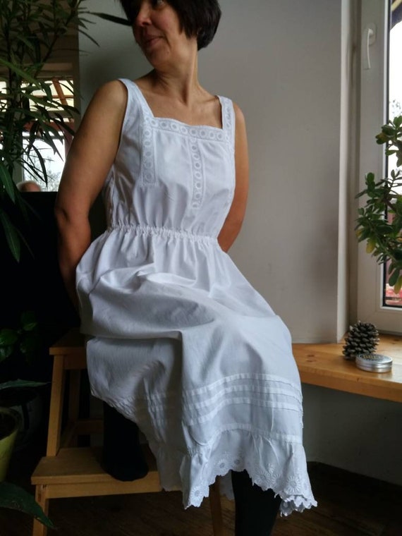 Antique white cotton night gown decorated with eye