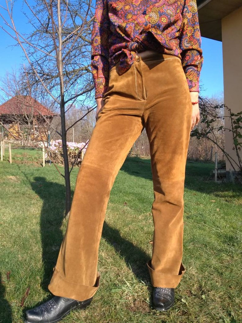 Vintage suede bell bottoms Vintage 90s does 60s brown suede pants.