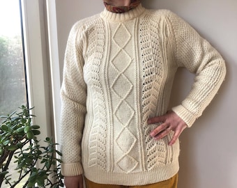Suéter vintage de punto de pura lana color marfil de los años 80. Talla M.