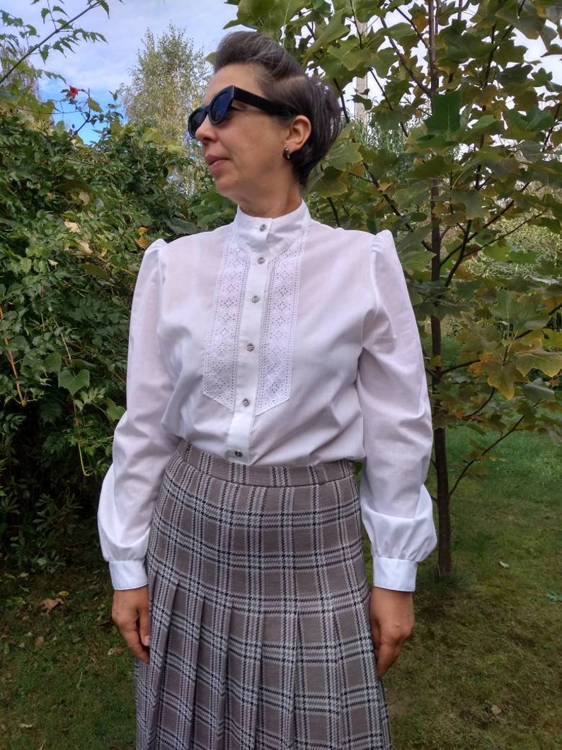 Vintage 70s grey and brown plaid pleated skirt.