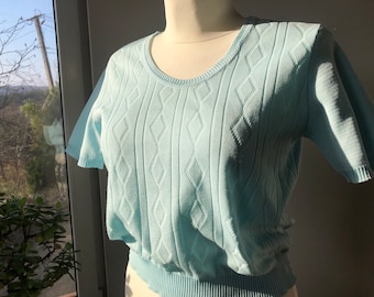 T-shirt crimplene a maniche corte vintage anni '60. Blusa con nodo azzurro. Taglia M.