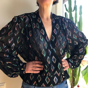 Vintage 80s transparent black wrap blouse with rainbow lurex diamond pattern. Sheer balloon sleeve party blouse.