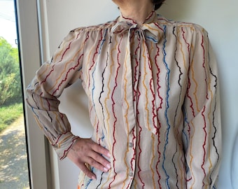 Vintage 70-80ss tan brown striped long sleeve blouse with tie-bow neckline. S-M size women’s blouse.