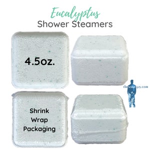 May include: Four white shower steamers with green flecks, each weighing 4.5 ounces. The steamers are packaged in shrink wrap. The text "Eucalyptus Shower Steamers" is at the top of the image. The text "4.5 oz." is on one of the steamers. The text "Shrink Wrap Packaging" is on another steamer.