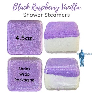 May include: Four purple and white shower steamers with the text "Black Raspberry Vanilla Shower Steamers" and "4.5 oz."  The steamers are packaged in shrink wrap.
