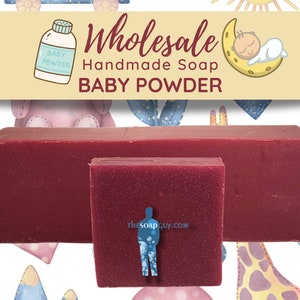 May include: Two bars of handmade soap, one large and one small, in a deep red color. The soap is labeled "Wholesale Handmade Soap Baby Powder".