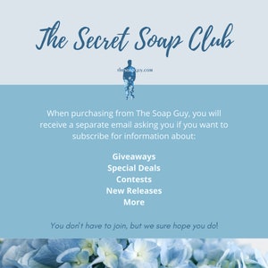 May include: A blue and white graphic with the text "The Secret Soap Club" and the website address "thesoapguy.com". The graphic also includes information about subscribing to receive giveaways, special deals, contests, new releases, and more.