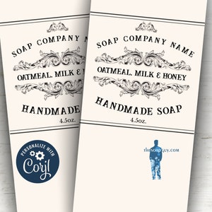 May include: Two white labels with black text and ornate designs. The top label reads "SOAP COMPANY NAME" and "OATMEAL, MILK & HONEY" with a decorative flourish. The bottom label reads "HANDMADE SOAP" and "4.5oz.". The left label has a blue circle with the text "PERSONALIZE WITH Coril" and a gear icon. The right label has a blue silhouette of a person with a blue soap bubble design.
