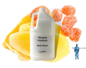 May include: A white plastic gallon jug of premium handmade body butter. The jug has a black label with the text "Premium Handmade Body Butter 1 Gallon". The jug is surrounded by orange and yellow candy.