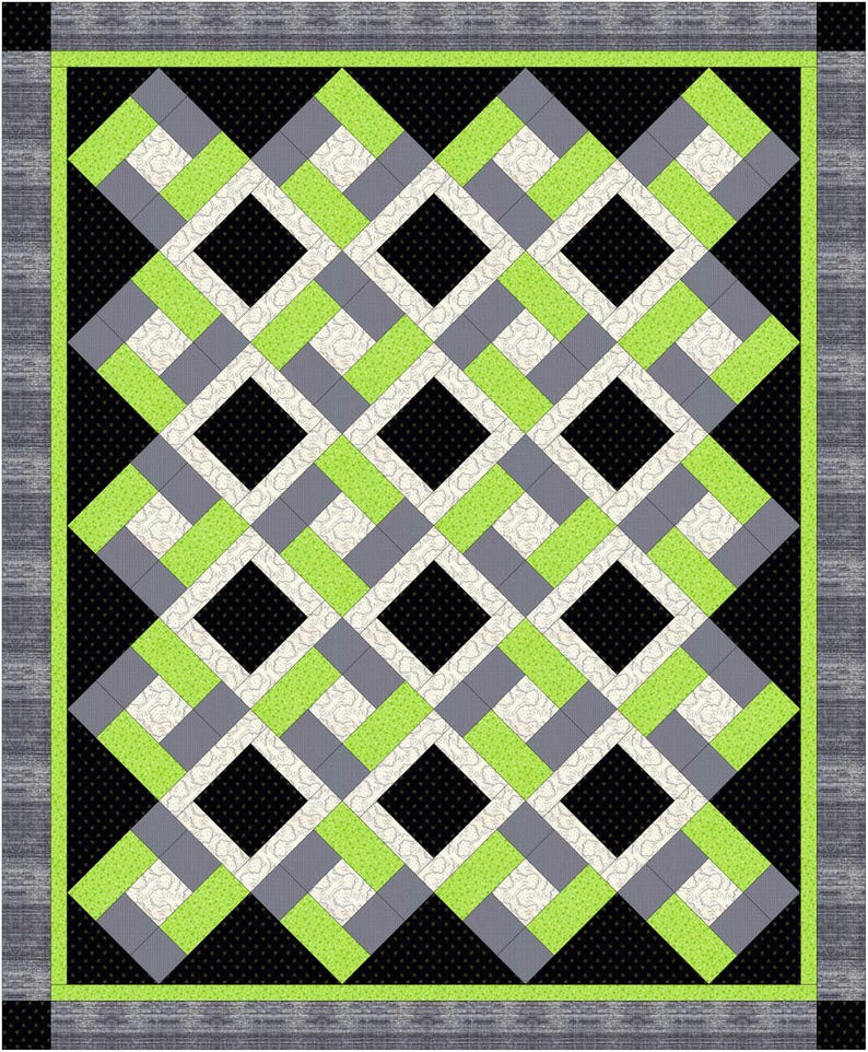 K&ouml;nnte beinhalten: Geometrischer Quilt mit sich wiederholendem Rautenmuster. Das Design zeigt schwarze, graue, wei&szlig;e und lindgr&uuml;ne Bl&ouml;cke. Der Quilt hat einen grauen Rand mit einem lindgr&uuml;nen Innenrand.