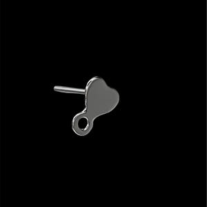 May include: A silver-toned metal earring post featuring a flat, heart-shaped top and a small circular loop extending from the bottom, designed for attaching charms or dangles to create custom jewelry pieces against a solid black background.