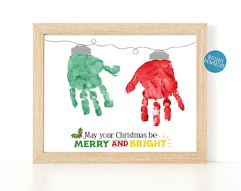 May include: A printable Christmas card featuring two handprints, one green and one red, shaped like Christmas lights. The text reads "May your Christmas be Merry and Bright".