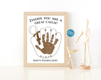 May include: A printable Father's Day card with a baseball glove and baseball. The glove has a brown handprint inside. The text reads "Daddy, you are a great catch! Happy Father's Day!"