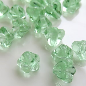 Peridot Green Transparent Glass, Czech Tiny Bell Flower, 4 mm by 6 mm Beads- Item F70-15