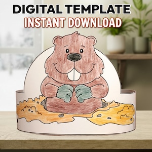 Peut inclure: Une couronne de la fête de la marmotte en papier avec une illustration de marmotte de dessin animé. La marmotte est brune avec des moufles vertes et sort d'un trou. La couronne porte le texte "DIGITAL TEMPLATE INSTANT DOWNLOAD" en haut.