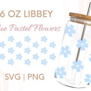 May include: A 16 oz Libbey glass with a blue pastel flower pattern. The glass has a straw and a wooden lid. The text "Blue Pastel Flowers" is written in pink on a white background. The text "16 oz Libbey" is written in brown on a white background. The text "SVG | PNG" is written in brown on a white background.