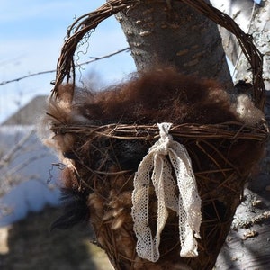 Nesting basket, to hang on the side of your shed or even in a tree