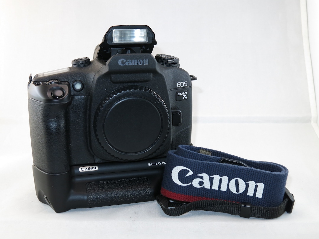 Canon EOS Elan 7N SLR Film Camera Body, Battery Pack and Strap in