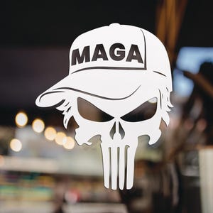 May include: White vinyl sticker of a skull wearing a red, white, and blue baseball cap with the text "MAGA" on the front.