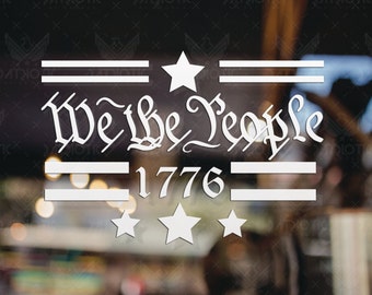 May include: White vinyl decal with the text "We the People" in a stylized font, with the year "1776" below it. There are two horizontal lines above and below the text, and a star above the text. There are three stars below the year.
