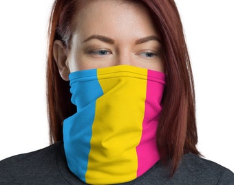 May include: A person wearing a face covering with a blue, yellow, and pink striped pattern. The face covering is made of fabric and covers the person's nose and mouth.