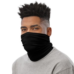May include: A person wearing a black face covering. The face covering is made of a soft, stretchy fabric and covers the nose and mouth.
