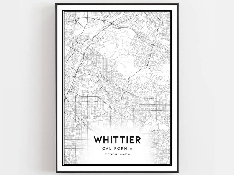 May include: Black and white map print of Whittier, California. The map shows the city streets and includes the coordinates 33.9742&deg; N, 118.1437&deg; W.