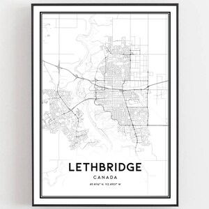 May include: Black and white line art map of Lethbridge, Canada. The map shows the city's streets and features the city name and coordinates.