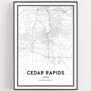 May include: Black and white map print of Cedar Rapids, Iowa. The map shows the city's streets and landmarks. The text "CEDAR RAPIDS, IOWA, 41.5742° N, 91.4074° W" is printed below the map.