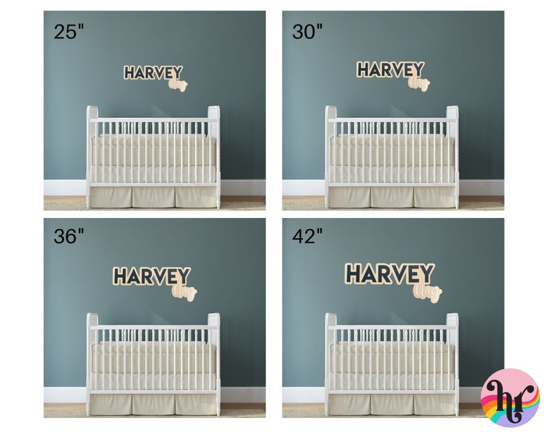May include: Four images showcasing a white crib with a beige skirt, against a teal wall. Each image features a wooden sign that spells "HARVEY" and a small wooden shape. The signs are available in 25", 30", 36", and 42" sizes.