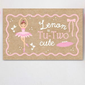 May include: A birthday party scene with pink and white balloons and a sign that reads "Lenon is Tu-Two cute." The sign features a ballerina illustration in a pink tutu and a matching bow.