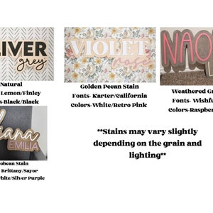 May include: Wooden name signs in various styles and colors. The signs include the names "OLIVER", "VIOLET", "NAOMI", and "ILIANA" with different font styles and color combinations. The text "EMILIA" and "LUNA" are also included.